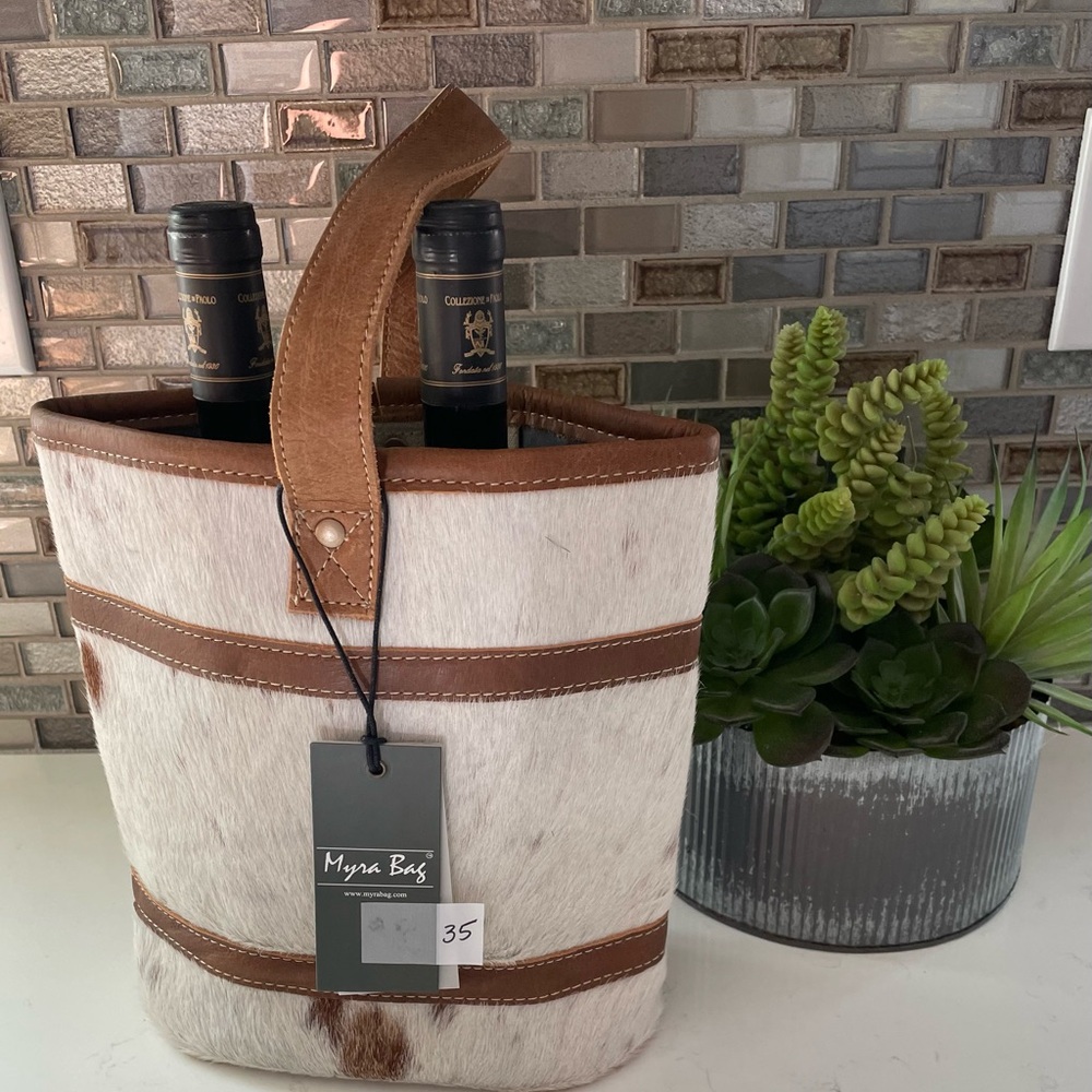 s2247. Cowhide wine bag. Holds two